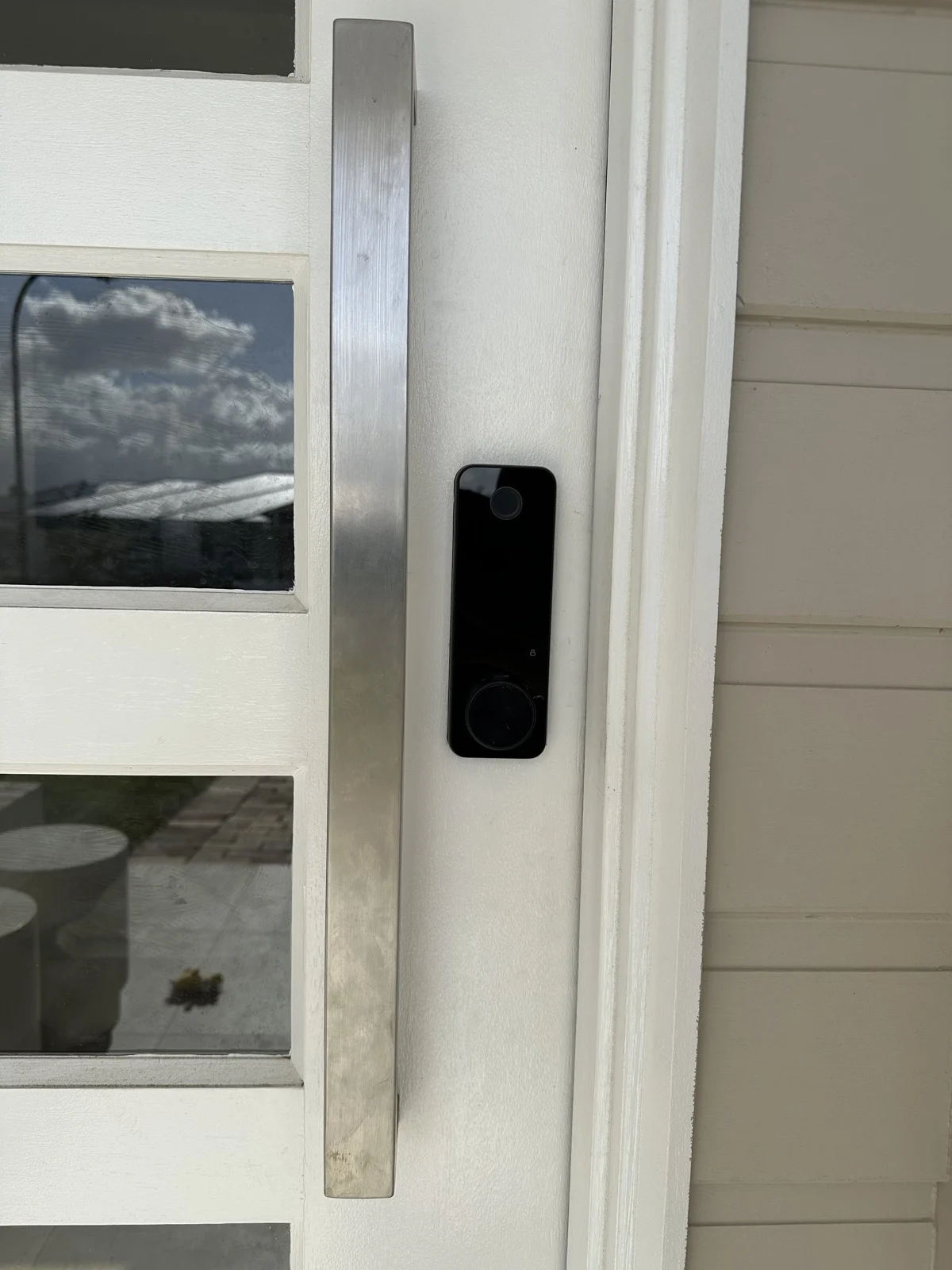 Digital lock fitted to a white front door